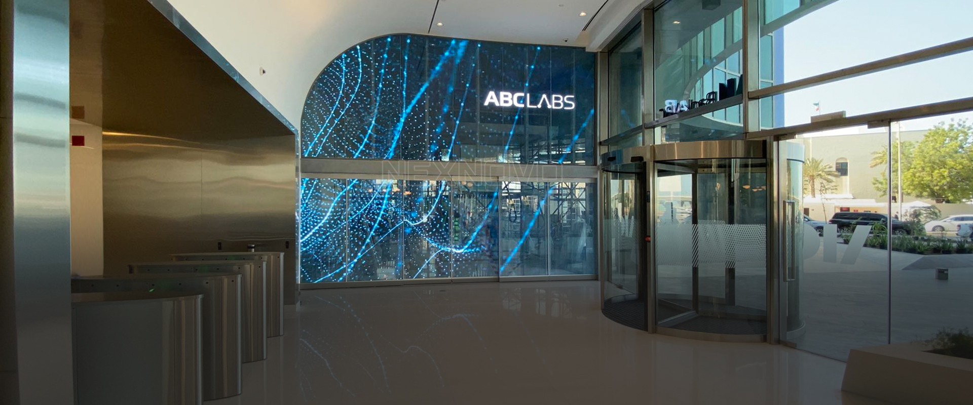 Curved and custom-shaped transparent LED creative installation