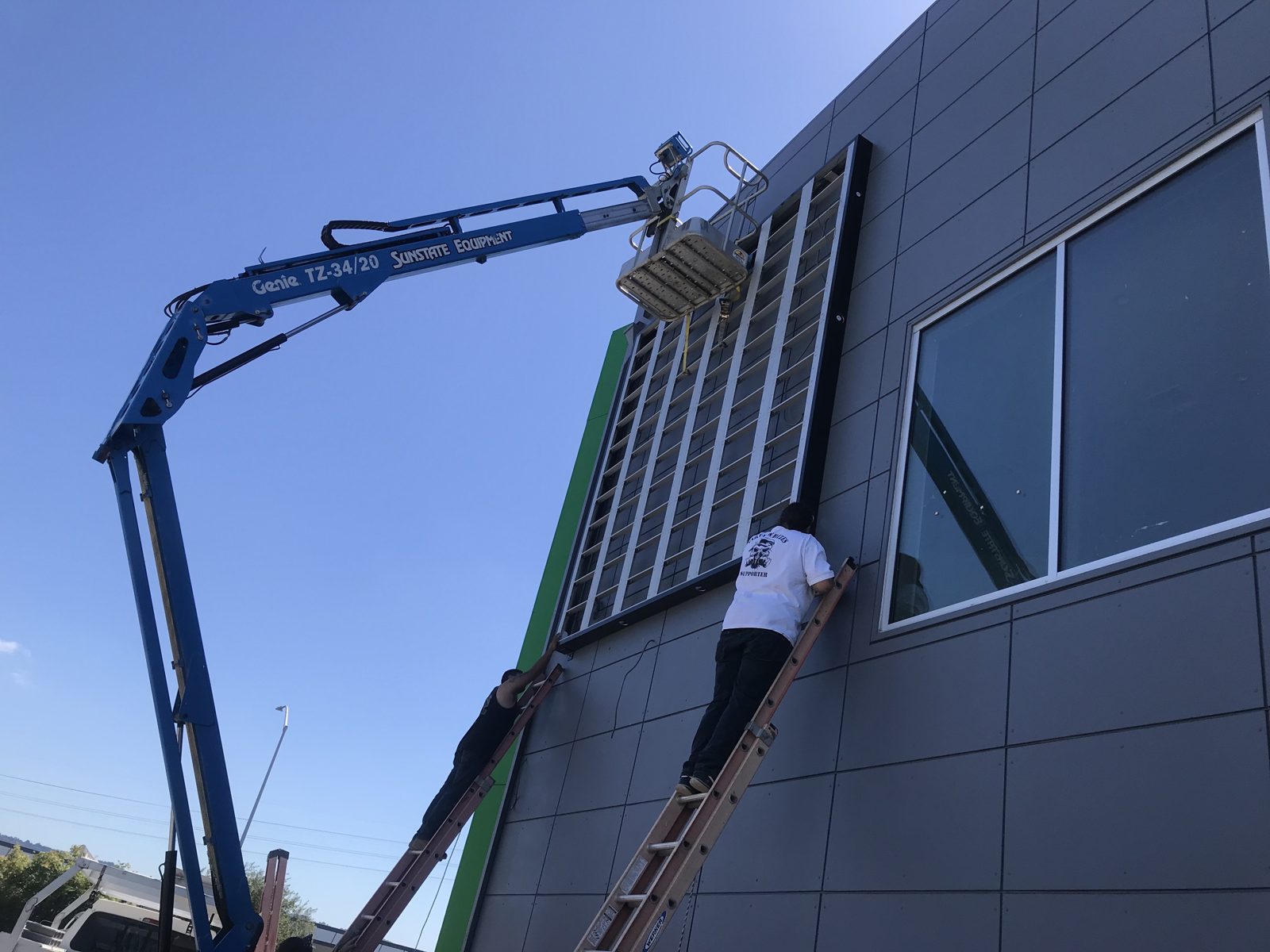 Boom lift placing cabinets